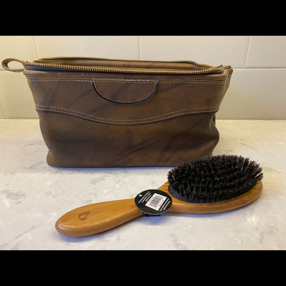 Men’s leather toiletry kit with soft wooden brush.